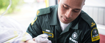 Paramedic in new (2014) green uniform