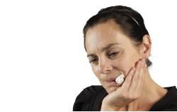 Ask the patient to bite down firmly over a pad that covers the tooth socket.