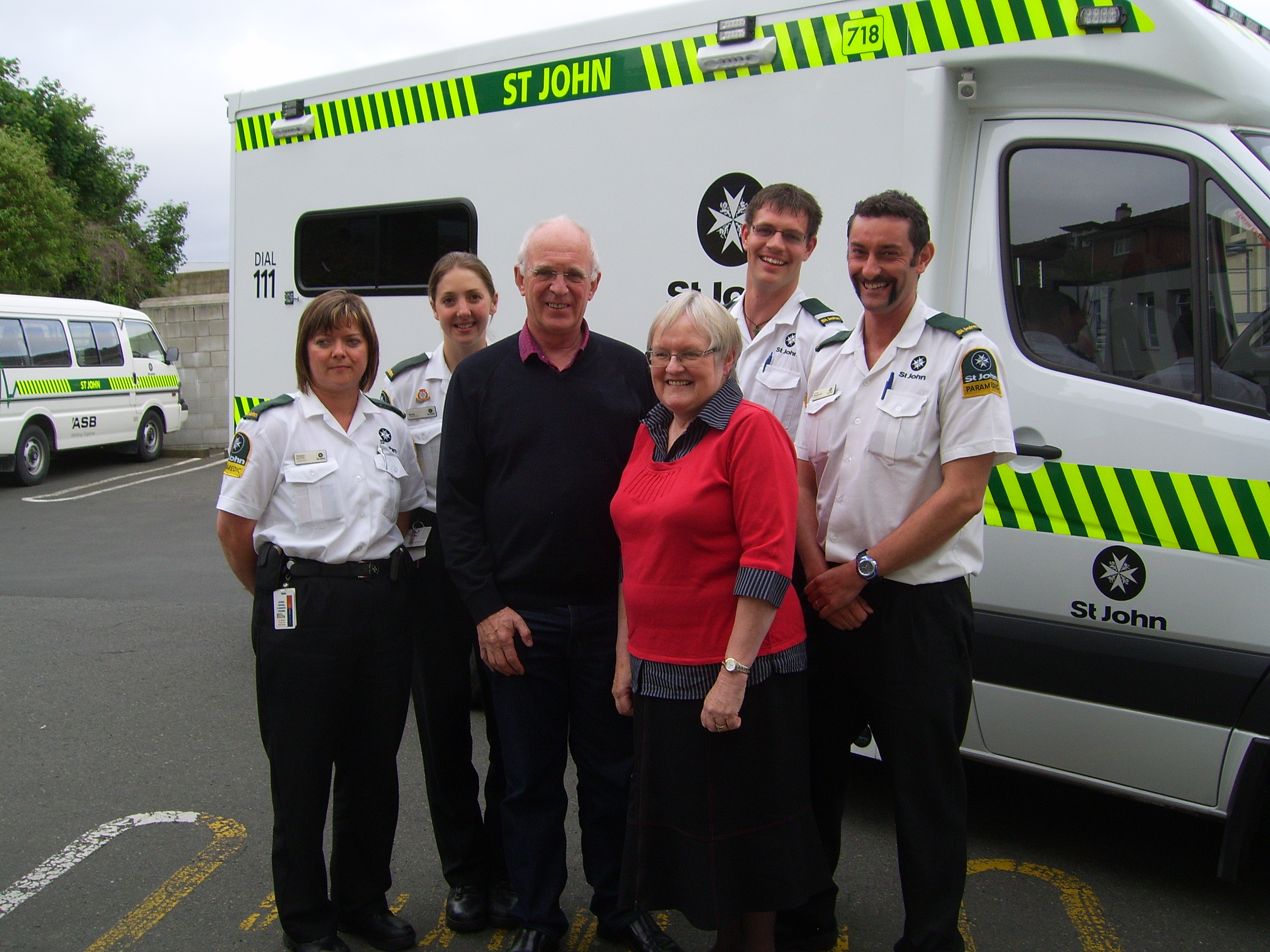 Ann and John with the St John paramedics who saved her life