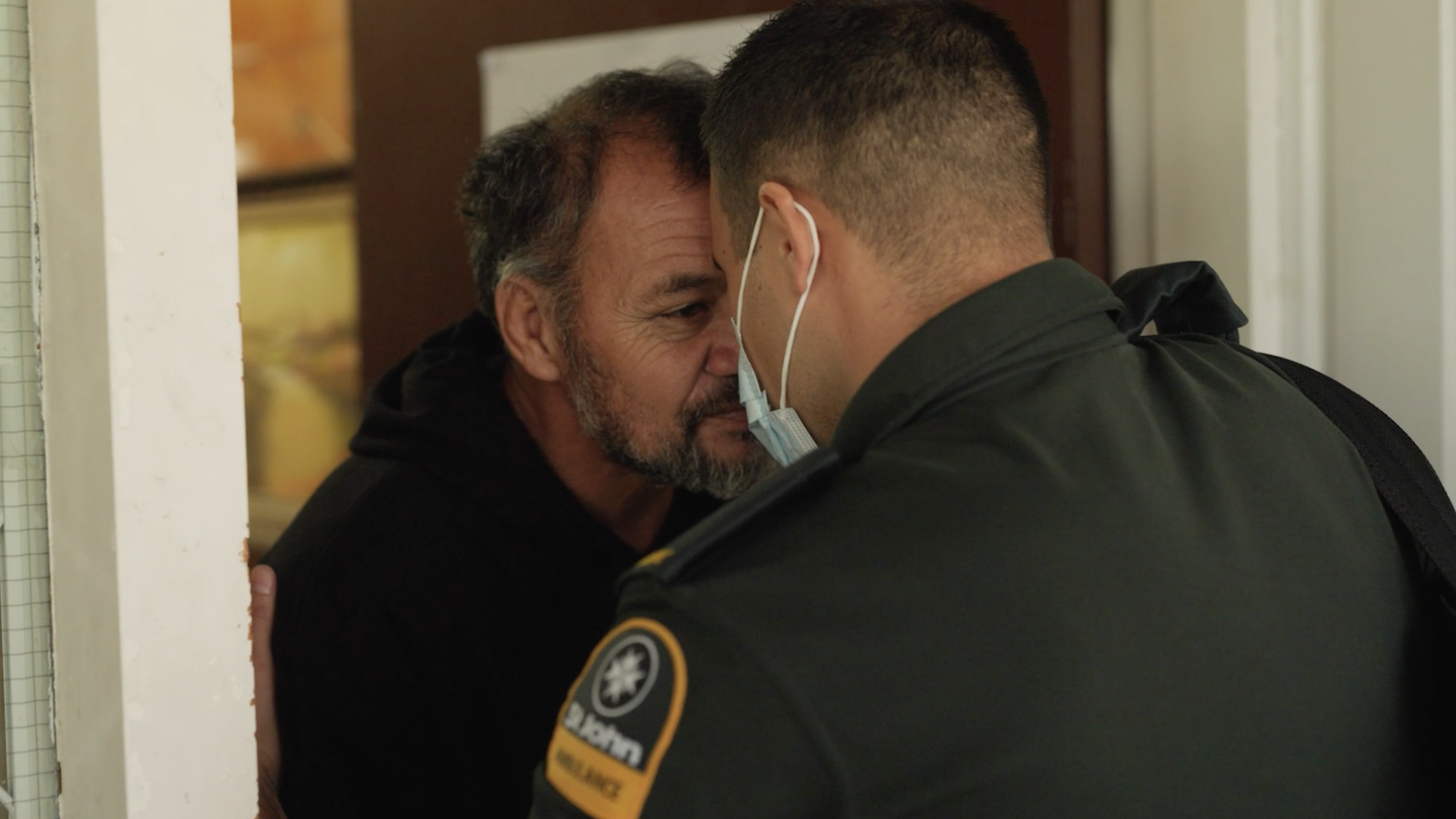 Hato Hone St John Paramedic being greeted with a hongi