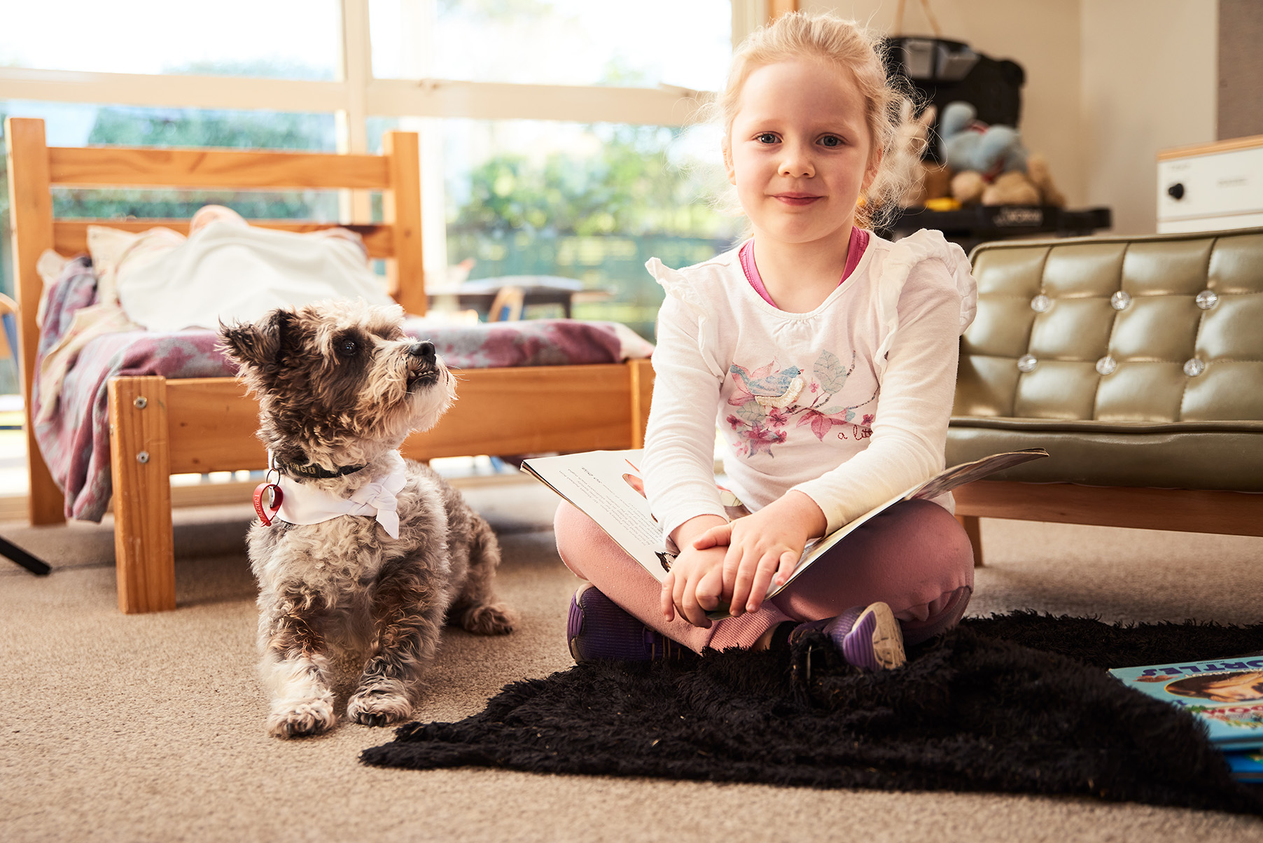 Primary school student ready with a dog