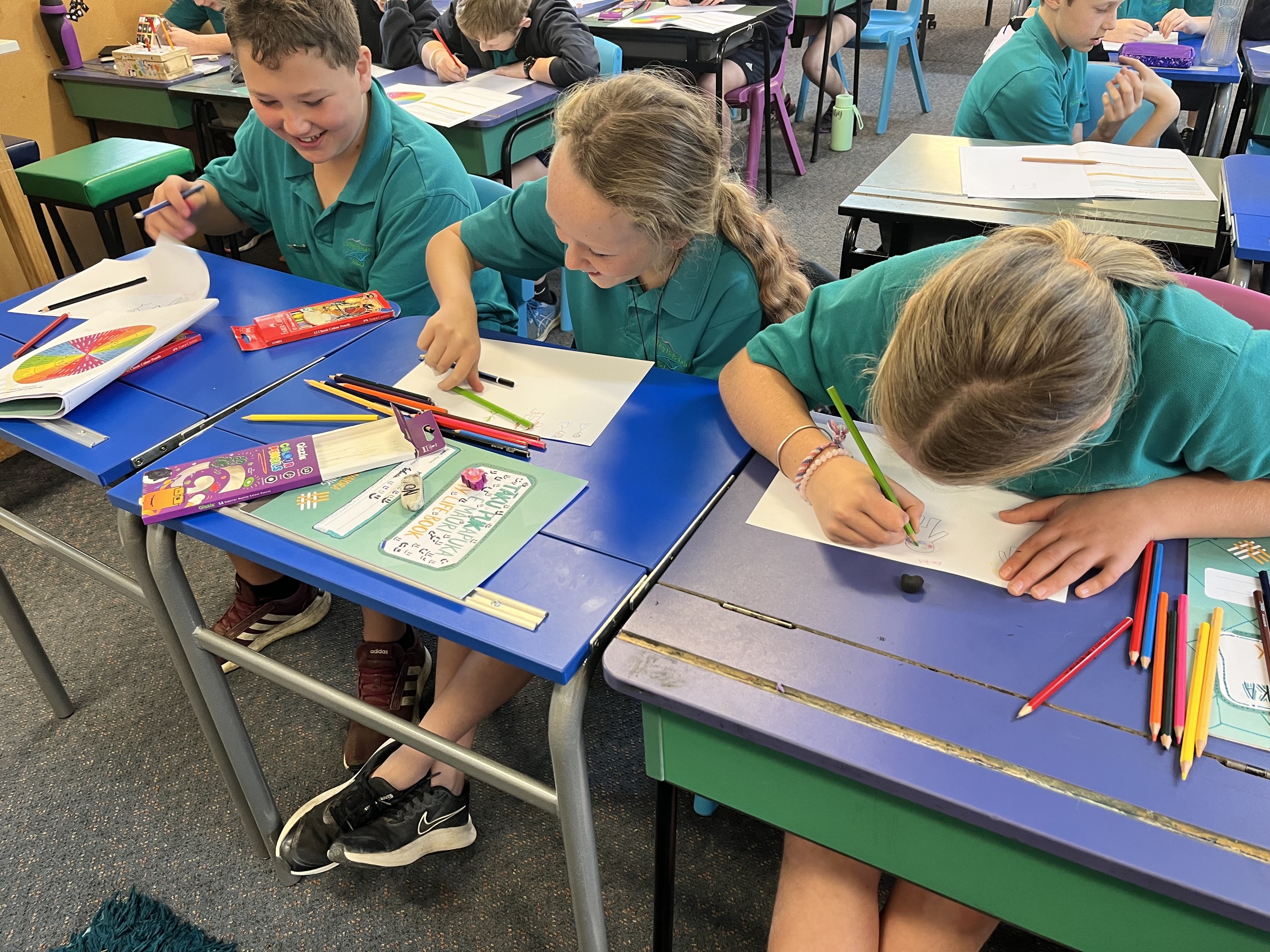 Young student reading the feelings wheel