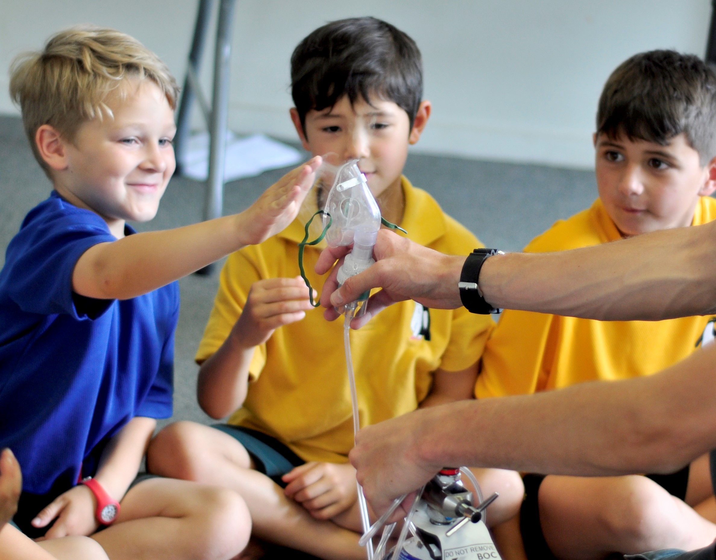 Young students learning about CPR